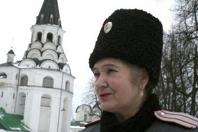 In the distinctive uniform of the Cossacks, a sabre sheathed at her side, Yulia Tkachenko, is the only woman ataman or leader of the legendary warriors, but there is no doubt who is in charge when she leads her men on patrol