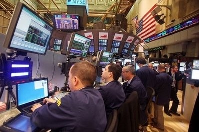 Traders work in the newly renovated section of the New York Stock Exchange. AFP files