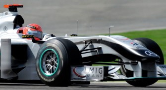 Mercedes GP's German driver Michael Schumacher drives at the Bahrain international circuit on March 13, 2010 in Manama, during the third free practice session of the Bahrain Formula One Grand Prix. AFP PHOTO