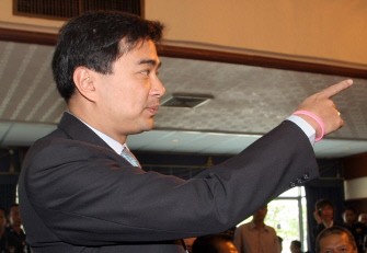 Thai Prime Minister Abhisit Vejjajiva gestures prior press conference at military base in Bangkok on March 15, 2010. AFP photo