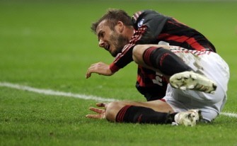 David Beckham lays on the pitch during the Italian Serie A football match AC Milan against Chievo on March 14, 2010 at San Siro Stadium in Milan. AFP PHOTO