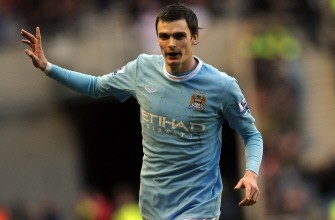 Adam Johnson gestures after scoring the equalising goal during extra time in the English Premier League football match between Sunderland and Manchester City on March 14, 2010. AFP PHOTO