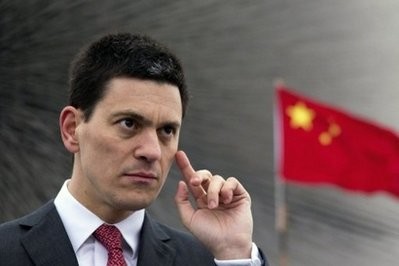 David Miliband gestures as he delivers a speech in front of the nearly completed United Kingdom pavilion at the 2010 World Expo site in Shanghai. AFP photo