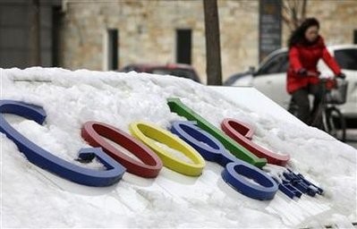 A woman rides a bicycle past the Google China headquarters in Beijing March 15, 2010
