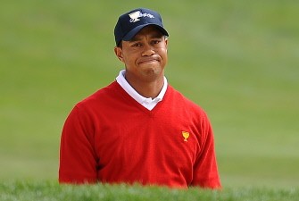 (FILES) In a file picture taken on October 8, 2009 US golfer Tiger Woods reacts to his shot out of a bunker on the 5th hole on the first day of the Presidents Cup golf competition at Harding Park Golf course in San Francisco, California. AFP file