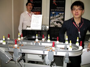 FlexLink displays a drive and puck handling system with a notice reading “Agent Needed in Vietnam) (Photo: Tuong Vy)