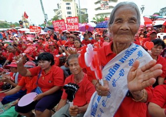 Red-shirted supporters of deposed Thai premier Thaksin Shinawatra shout slogans during an anti-government protest in Bangkok on March 18, 2010. AFP photo