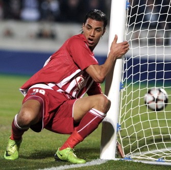 Bordeaux' forward Marouane Chamakh scores a goal during the Champions League cup football match vs. Olympiakos, on March 17, 2010 in Bordeaux. Bordeaux won 2-1. AFP PHOTO