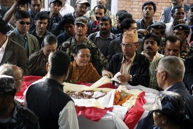 Supporters gather to pay respect to former Prime Minister Girija Prasad Koirala in Katmandu, Nepal, Saturday, March 20, 2010