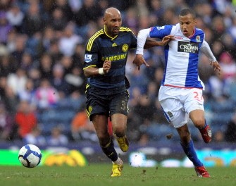 Chelsea's French forward Nicolas Anelka (L) vies with Blackburn Rovers' Swedish defender Martin Olsson during the English Premier League football match at Ewood Park on March 21, 2010. AFP PHOTO