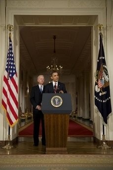 US President Barack Obama (C), standing with US Vice President Joe Biden, delivers a statement to the nation following the vote in the House of Representatives on health care reform in Washignton, DC, March 21, 2010. AFP photo