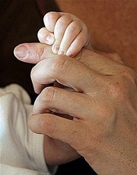 In what doctors described as a world first, a Danish woman has given birth to two children after her fertility was restored using ovarian tissue that was removed, frozen, thawed and then reimplanted after cancer treatment.