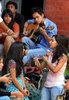 Students wait for their classes to begin at Kirori Mal college in New Delhi in 2009. (AFP)
