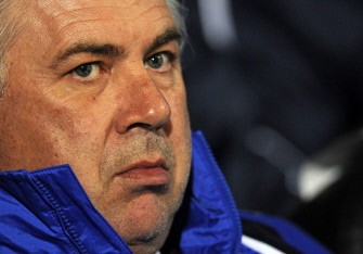 Ancelotti looks on before the English Premier League football match between Portsmouth and Chelsea on March 24, 2010. AFP PHOTO