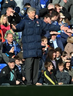 Arsenal manager Arsene Wenger gestures during the English Premier League football match between Birmingham City on March 27, 2010. AFP PHOTO