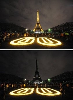 A combo shows the Eiffel tower submerging into darkness at 8:30 pm (local time) in Paris as part of the Earth Hour switch-off. AFP photo