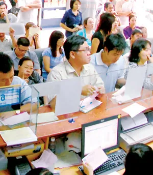Triển khai quyết định của Ngân hàng Nhà nước Việt Nam, hoạt động đầu tư trên sàn vàng chấm dứt từ ngày 30-3. Ảnh: ĐỨC TRÍ
