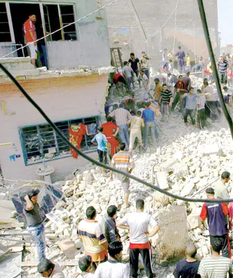 Hiện trường vụ nổ bom tại Baghdad, Iraq, ngày 6-4.