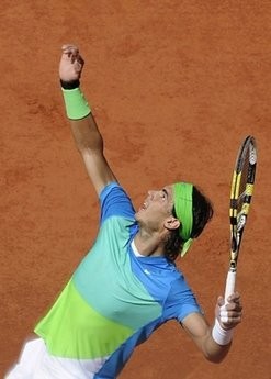 Nadal serves during his fourth round match against Bellucci in the French Open tennis championship. AFP photo