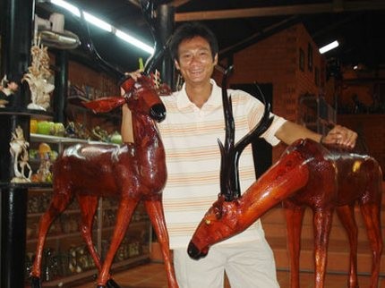 The Coi Nguon Museum's director Huynh Phuoc Hue stands at a corner of the museum