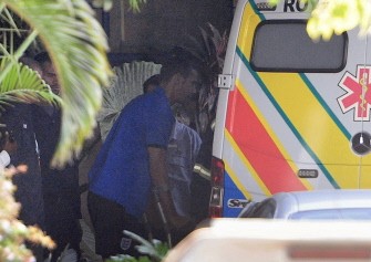 Rio Ferdinand (L) leaves the Netcare Fearncrest Hospital in Rustenburg, South Africa on June 4, 2010. AFP photo