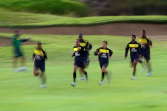 Brazil's players run during a team training session at the Randpark Golf Club on June 9, 2010 in Johannesburg. AFP photo