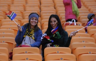 South African supporters cheer ahead of the start of the opening ceremony of the 2010 FIFA World Cup on June 11, 2010 at Soccer City stadium in Soweto, suburban Johannesburg. AFP photo