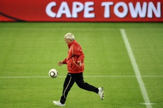 Marcello Lippi kicks the ball during training session Cape Town's Green Point Stadium on June 13, 2010.