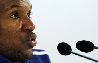 Eric Abidal is seen through the screen of a camcorder during a press conference in Knysna on June 13, 2010 during the 2010 World Cup football tournament in South Africa.