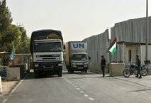 United Nations trucks carry supplies into Rafah town after crossing the Kerem Shalom crossing between Israel and the southern Gaza Strip on June 16. AFP