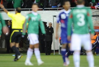 Domenech (C) reacts during their Group A first round 2010 World Cup football match on June 17, 2010 at Peter Mokaba stadium in Polokwane. Mexico won 2-0. AFP