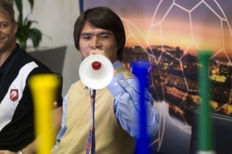 Niel Van Schalkwyk, the so-called inventor of South Africa's Vuvuzelas, holds a vuvuzela in England colours during a press conference, on June 18, 2010 at the V&A Waterfront in Cape Town.