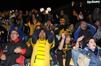 Socceroos fans react in anguish as they watch a big screen broadcast of the Australia v Ghana match at the FIFA fan fest site in Sydney on June 20, 2010. AFP