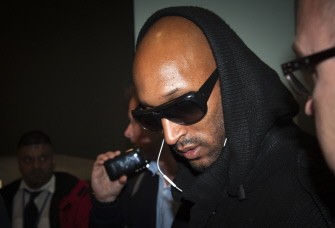 French footballer Nicolas Anelka arrives at Heathrow airport in London, on June 21, 2010. Anelka was dismissed from the French World Cup squad on June 20, 2010. AFP