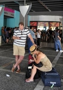 AFP/File – Tourists are stranded at the Greek port of Piraeus in late May 2010 during a union strike.