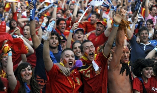Supporters of the Spanish football team react during the match between Spain and Portugal on June 29, 2010. AFP