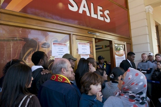 People queue to buy World Cup tickets at the FIFA Ticketing Centre, on July 1 2010, in Cape Town two days before the quarter final football match between Argentina and Germany. AFP PHOTO