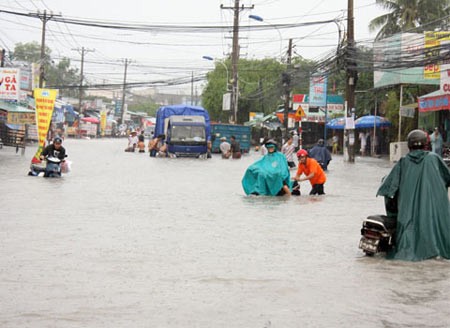A Ho Chi Minh City street flooded in the afternoon of July 1