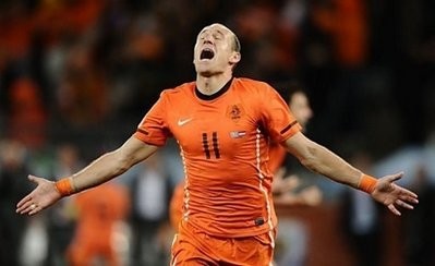 Netherlands' striker Arjen Robben celebrates after he scored his team's third goal during the 2010 World Cup semi-final match between Uruguay and Netherlands at Green Point Stadium in Cape Town. Netherlands won 3-2