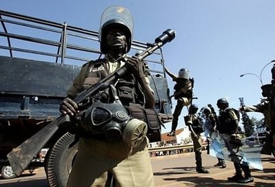Ugandan police are seen in Kampala. Explosions ripped through two restaurants in the Ugandan capital, killing at least 64 people as crowds watched the World Cup final, police said, terming the blasts a terrorist attack