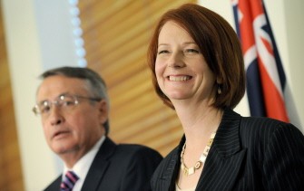 (FILES) A file photo taken on June 24, 2010 shows Australia's new prime minister Julia Gillard (R) and deputy prime minister Wayne Swann (L) at a press conference. AFP