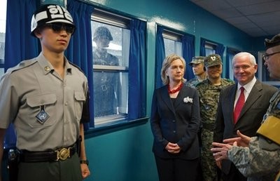 U.S. Army Col. Kurt Taylor, right, briefs U.S. Secretary of State Hillary Rodham Clinton, center, and U.S. Secretary of Defense Robert Gates, 2nd right, at the truce village of Panmunjom in the demilitarized zone (DMZ) that separates the two Koreas since the Korean War, north of Seoul, South Korea Wednesday, July 21, 2010, in Seoul, South Korea.