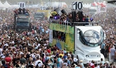 Participants of the Love Parade 2010 dance at the festival in Duisburg, western Germany.
