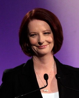 Julia Gillard smiles as she takes on Opposition Leader Tony Abbott during the leaders' debate at the National Press Club in Canberra on July 25, 2010. AFP