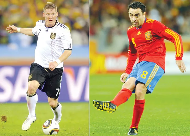 Bastian Schweinsteiger (Đức) và Xavi (Tây Ban Nha)