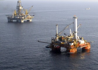 This US Coast Guard handout image shows rigs drilling a relief well and preparing the static kill are seen at the site of the Deepwater Horizon well about 40 miles (64km) from the southern Louisiana coast in the Gulf of Mexico July 31, 2010. AFP
