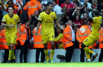 Marouane Chamakh (C) celebrates scoring against Liverpool during their English Premier League football match. AFP