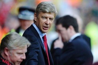 Arsenal manager Arsene Wenger arrives before their English Premier League football match against Liverpool at Anfield in Liverpool, on August 15, 2010. AFP