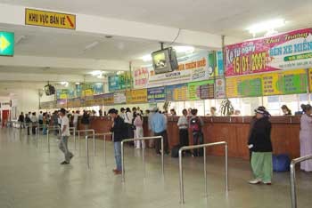 People buy tickets at Mien Dong Bus Station in HCM City’s Binh Thanh District