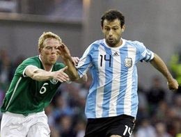 (File) Mascherano (R) in a game he plays for Argentina
